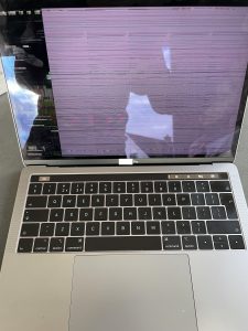 macbook screen broken Macbook Screen cracked or broken.