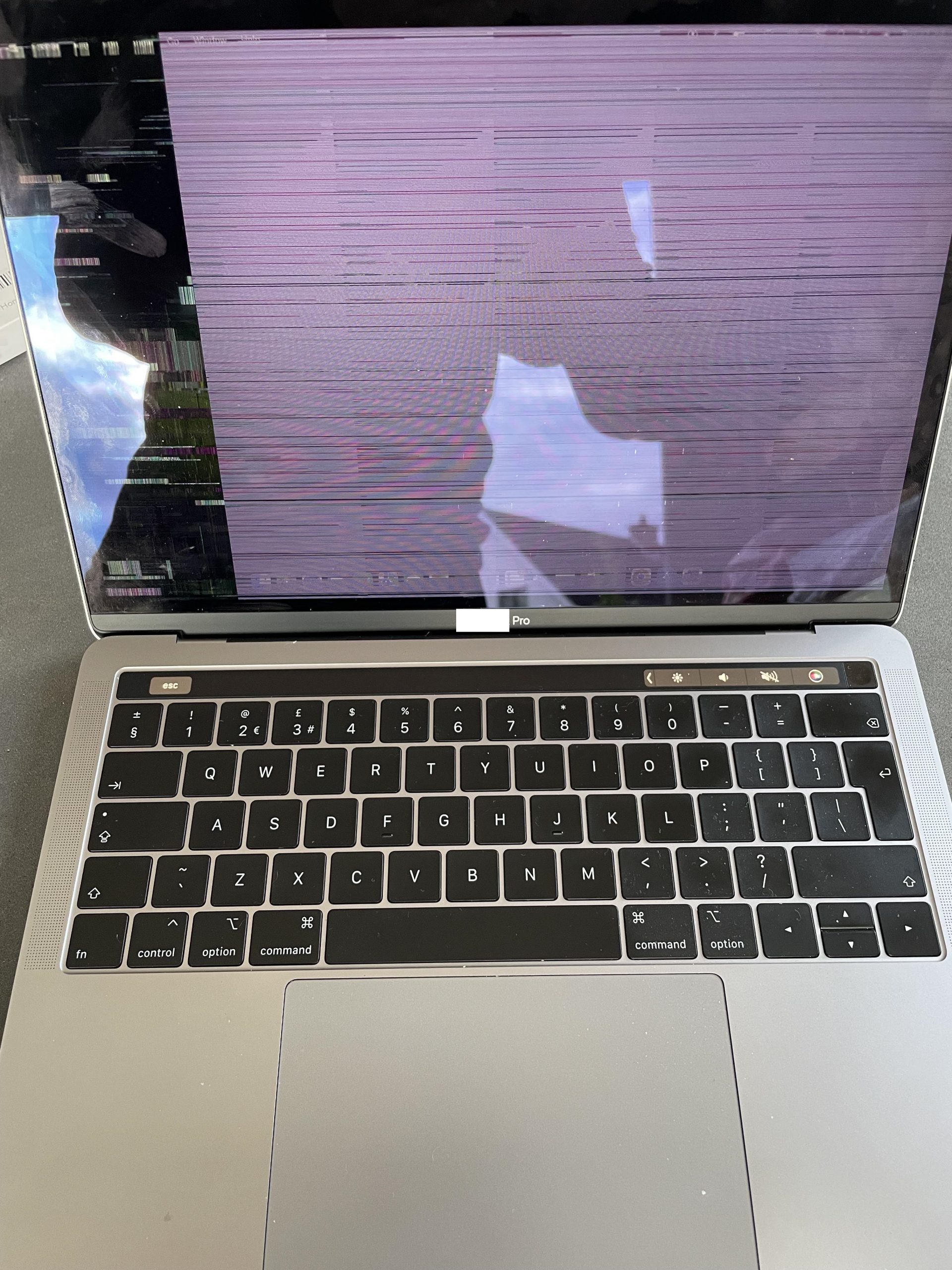 macbook screen broken Macbook Screen cracked or broken.